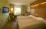 Double room with yellow floor